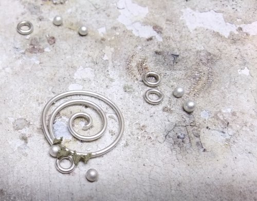 Judy Larson's Bali Style Earrings - , Contemporary Wire Jewelry, Stamping, Stamps, Butane Torch, Soldering, Solder, Drilling, Drill,  Place medium paste solder on the scroll where the next ball